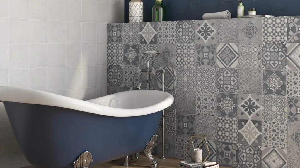 На стене - плитка Sloane и Lambeth, цвета цемент, 22,3x22,3 см; на полу - Nera, оттенка дуб, 25x150 см